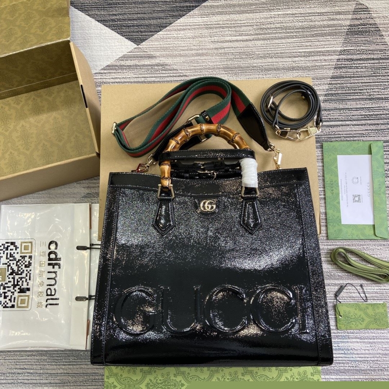 G*u*i top handle bags